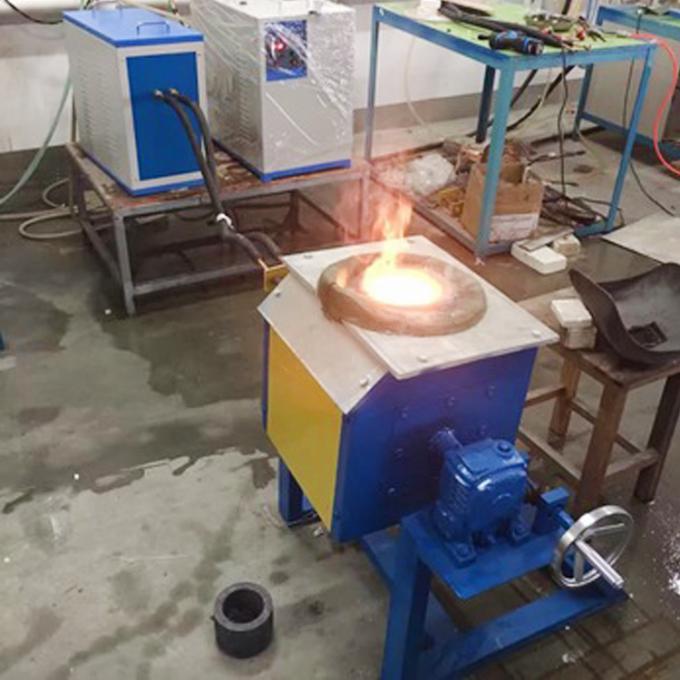 Crisol de cobre de bronce de la inducción de frecuencia media con el horno fusorio 150kg de la inducción inclinable hidráulica del sistema